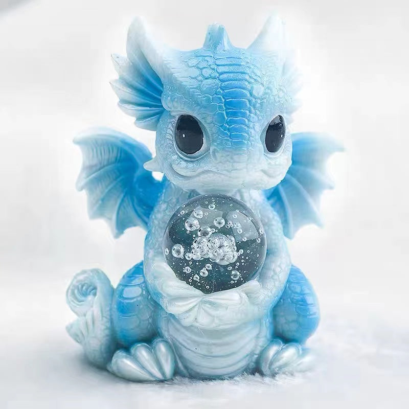 Baby dragon with crystal ball